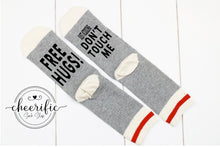 Load image into Gallery viewer, Free Hugs Just Kidding Don&#39;t Touch Me Socks
