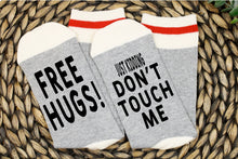 Load image into Gallery viewer, Free Hugs Just Kidding Don&#39;t Touch Me Socks
